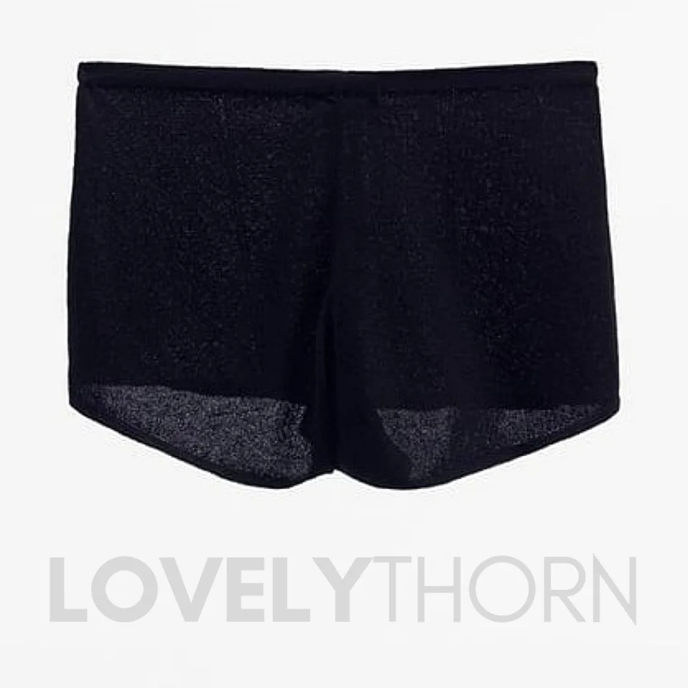 ZARA // black slightly frilled hem high elastic waist knit shorts